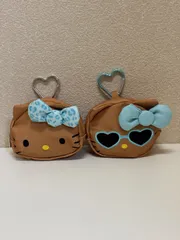 日焼けしたハローキティ& 日焼けしたハローキティサングラスのポーチチャーム 新品未使用品 【クーポン利用で1,080円】