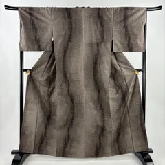 【美品】 大島紬 身丈163.5cm 裄丈67cm M 袷 証紙 幾何学 茶色 正絹 名品 【中古】