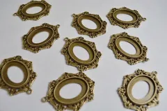 ビーズクラブ レジン枠 楕円 ハート４ デザイン 金古美 10個 空枠 フレーム レジンフレーム 素材 ハンドメイド カン付き