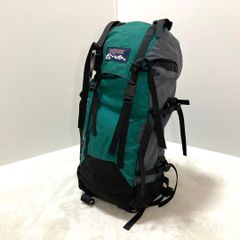 JanSport hiking backpack with tags, 50L, black and green.