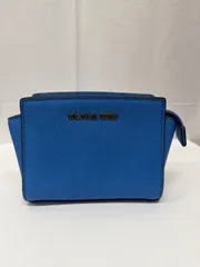 B142-10  マイケル・コース（Michael Kors）セルマ ミニ（Selma Mini）クロスボディバッグ