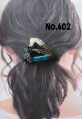 マルチカラーの三角パッチンピン