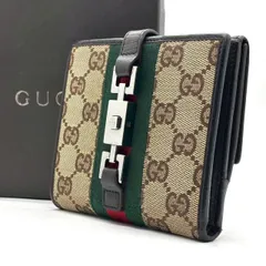 【変わらない安心感】　GUCCI　二つ折り財布 ジャッキー GGキャンバス シェリーライン コンパクト　ブラウン