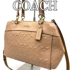 コーチ COACH　エンボスシグネチャー レザー トートバッグ キャリーオール ベージュ 2WAY 肩掛け ショルダー 通勤 通学 きれいめ 上品 フォーマル カジュアル対応 大容量 ３層