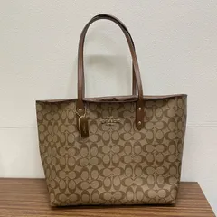 ★【美品】COACH コーチ トートバッグ 肩かけ　シグネチャー F76636 PVC×レザー ブラウン 茶色 ロゴ型押し ロゴ金具 ゴールド金具 チャーム付 A4サイズ収納可  大容量 レディース メンズ ユニセックス