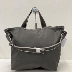 新品 下げ札あり nouer シャイニーミニトートバッグ （シルバー - メルカリ