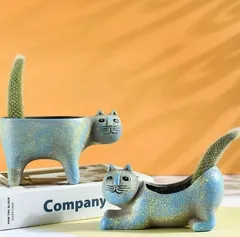 気持ち悪い顔のネコ グリーン 観葉植物 プランター 多肉植物 植木鉢 花瓶 緑 サボテン かわいい おしゃれ 室内 屋外 陶器 鉢植え 尻尾 引越し祝い プレゼント おもしろ雑貨 インテリア キャット 動物 オブジェ 置物