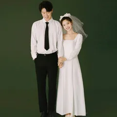 フレンチスタイルのウェディングドレス 2026年冬新作 旅行写真 アンティークスリーブ ホワイト ウェディングドレス ファクトリーソース