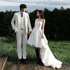 【新品・未使用】バタフライデザインが垂れ下がるブラックのヘップバーン風ストラップレスドレス。ハイセンシティブなスタイル。ウェディングドレス。