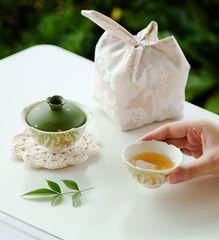 Chinese Tea Set: Gaiwan (lidded bowl), Teacup, Placemat, and Drawstring Bag Set - Convenient to Carry - Features a Rock Mine White Sea Blue and Gold-Plated Floral Pattern - Perfect for Travel