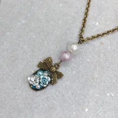 アンティーク調リボンとフラワービーズのネックレス パステルカラー