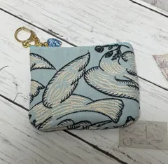 ハンドメイド　ミナペルホネン　following dayライトブルーのミニポーチ