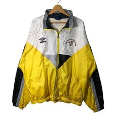 UMBRO ナイロンジャケット イエロー ブラック - メルカリ