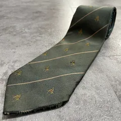 【Paul Stuart】レジメンタルストライプネクタイ　ビジネス向け　グリーン　机に座る人　刺繍　ジャガード　人モチーフ　緑　ポールスチュアート