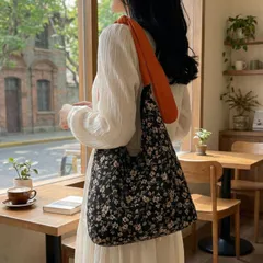 花柄 トートバッグ ショルダーバッグ レディース キャンバス 結び目 リボン オレンジ 黒 ブラック 北欧風 ボタニカル柄 大容量 A4 肩掛け マザーズバッグ エコバッグ カジュアル おしゃれ かわいい 調整可能 コットン 布バッグ 軽い 軽量 送料無料