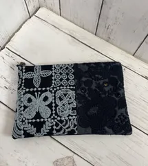 ハンドメイド　ミナペルホネン　forest tile×smile flowerダークネイビーのポーチ