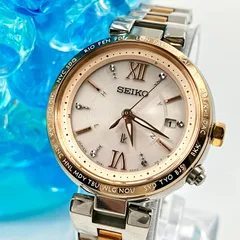 【美品】セイコー SEIKO ルキア 1B25-0AJ0 ソーラー電波 チタン 腕時計 コンビカラー デイト 石入り 10気圧防水 レディース ワールドタイム