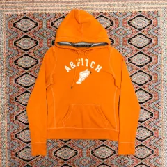 アバクロンビー ヘルメス靴 オレンジ 起毛 フード付きTシャツ レディース Mサイズ