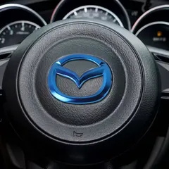 新品 未使用 マツダ ステアリングエンブレムステッカー ブルーのサムネイル