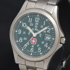 中古]スイスミリタリー レディース腕時計 ブルー系文字盤×水色布ベルト 
