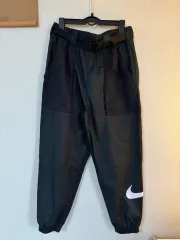 L NIKE ウィメンズ コンフォート スウッシュ ウーブン パンツ