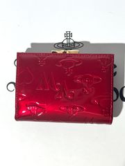 赤いエンボス加工三つ折り財布 - メルカリ