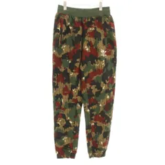 アディダスオリジナルス adidas originals Pharrell Williams hu Hiking Camo Pant ジョガーパンツ カモフラ 迷彩柄 裏メッシュ ロゴ プリント M カーキ 茶 ブラウン 赤 レッド CY7870 /KUのサムネイル