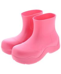 フェラガモ ピンク ゴム製 ロングブーツ - メルカリ