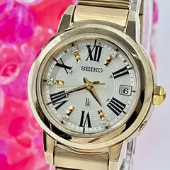 【未使用】セイコー ルキア SEIKO LUKIA 電波ソーラー チタン 腕時計 レディース ゴールド 1B22-0AD0