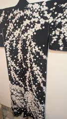 【美品】黒地に白の桜満開柄の華やかな訪問着