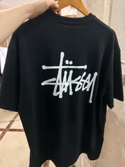 スツーシー STUSSY ロゴ文字プリントの丸首プルオーバー半袖Tシャツ 男女兼用