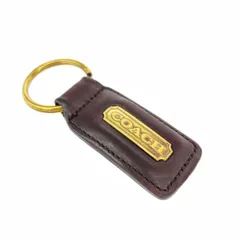 COACH コーチ キーホルダー  ロゴプレート/レザータグ/    ゴールドカラー×ブラウン ユニセックス / 240001186383
