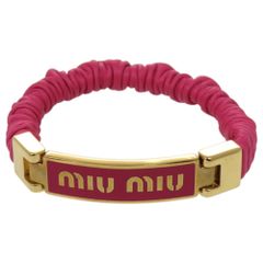 美品♡MIU MIU ミュウミュウ ロゴ ビジュー バングル ブレスレット ミュウミュウ miu miuバングル ブレスレット ピンク ゴールド Mサイズ