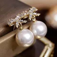 188Rp 【リボン】 ピアス CZダイヤ 揺れる 高級感 おしゃれ 可愛い