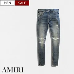 【定価176,000円(税込)】AMIRI -アミリ-   都会的な大人カジュアルを演出する！拘りぬいたウォッシュダメージ＆リペア加工 が施された テーパードデニムパンツ Fractured Jeans Crafted Indigo Denim ストレッチ ウ