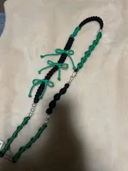 パラコードスマホショルダー グリーン ブラック リボン パール