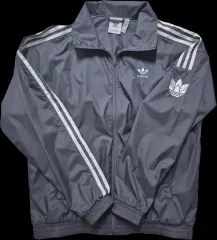 アディダス ウィンドブレーカー レトロ トレフォイル ジャケット ダークグレイ