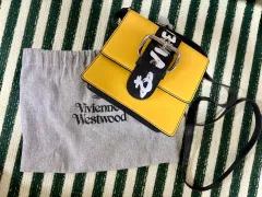 VIVIENNE WESTWOOD ヴィヴィアン・ウエストウッド イェロー クロスバック