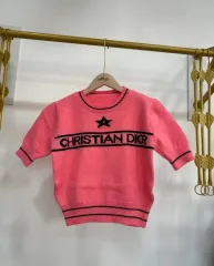 ピンク半袖ニット55まで