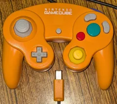 ゲームキューブ コントローラ　オレンジ 中期型 ※分解清掃済。左スティック部品交換。両スティックカバー互換品、ネジ変色 20933071