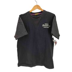 インディアンモーターサイクル INDIAN MOTORCYCLE カウレザー パンチングアーム バッグスカル プリント Tシャツ メンズ JPN：L 