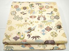 琉球紅型染名古屋帯 市松地紋 花文様 竹 華やか 証紙付き - メルカリ
