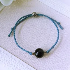 天然石オニキスとサファイアブルーのワックスコード四つ編みブレスレット