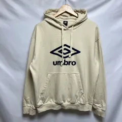 正規品/100 umbro アンブロ アイボリー ビックロゴ フーディーTシャツ
