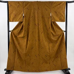 小紋 身丈164cm 裄丈64cm M 袷 紬地 井桁 燕 絞り 山吹茶色 正絹 名品 【中古】