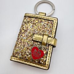 未使用保管品 コーチ 手帳型チャーム キーホルダー シグネチャー総柄