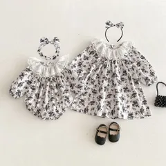 キッズ花柄ワンピース女の子ベビー赤ちゃんロンパース子供服ドレス白黒モノクロ7 ガーリー70 80 90 100 110 120 130 140かわいいナチュラル長袖おしゃれフリル可愛い上品お出かけSNS映えボタニカル記念撮影【arc】