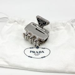 PRADA ヘアクリップ シルバー メタル - メルカリ