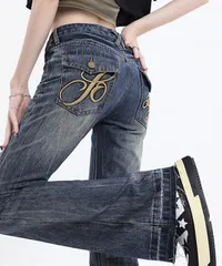 ロゴ刺しゅうフレアデニムパンツレディース