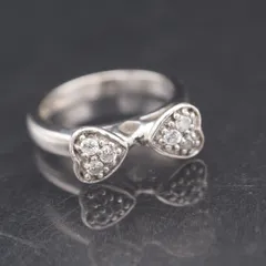 R040 Folli Follie フォリフォリ 925刻印 リング ダイヤモンド風 リボン デザイン シルバー 指輪 11号